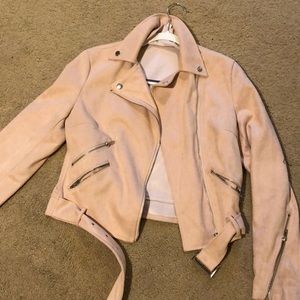 Pink suede jacket with buckle and zippers